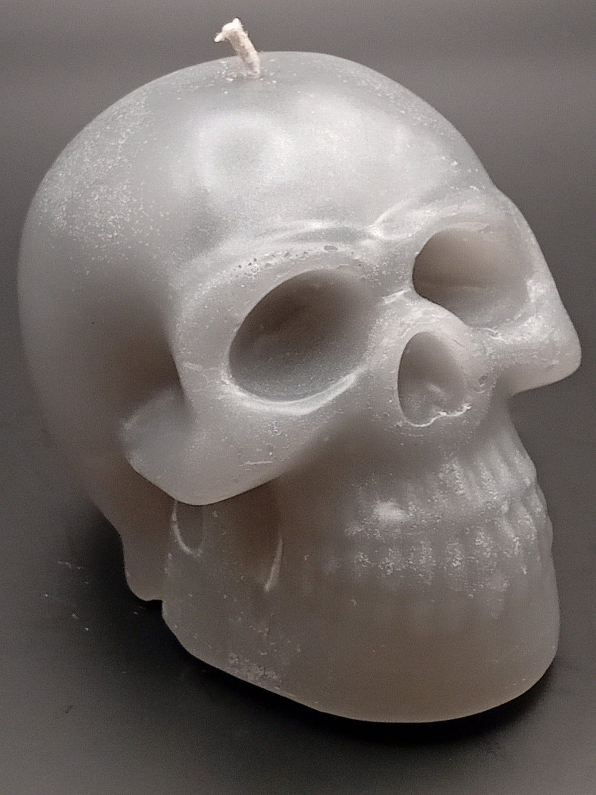 Large white handmade skull candle by Fly Design