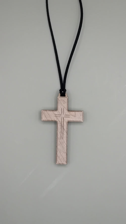 Engraved beech wood cross pendant on black faux suede cord