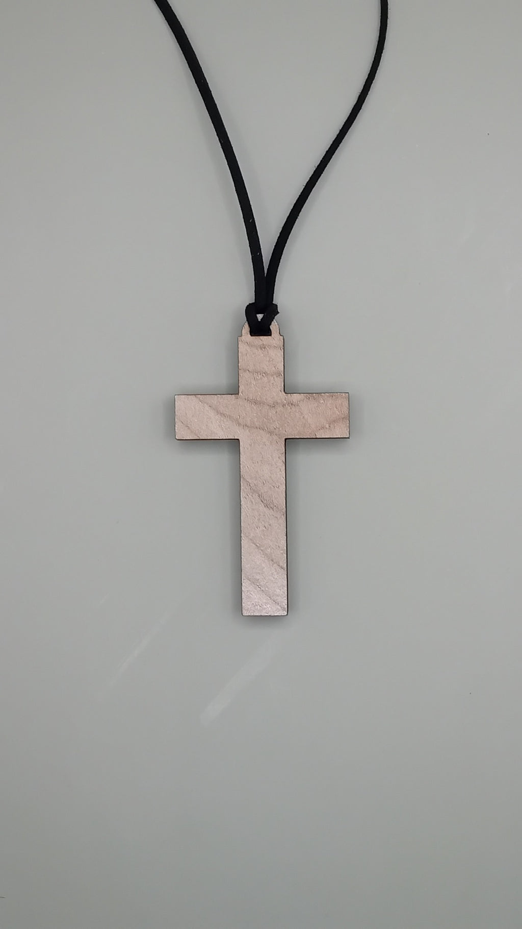 Plain beech wood cross pendant on black faux suede cord