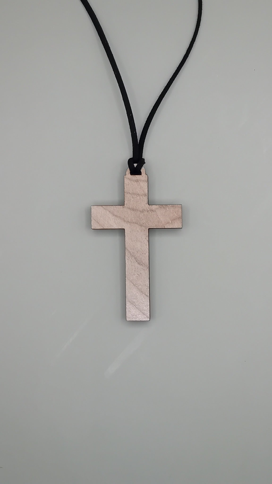 Plain beech wood cross pendant on black faux suede cord