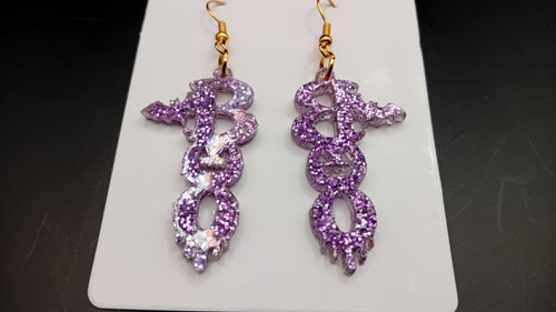 Purple sparkle BOO Halloween earrings with bat and pumpkin details