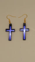 Blue mirrored acrylic cross earrings with black layered frame and gold hooks