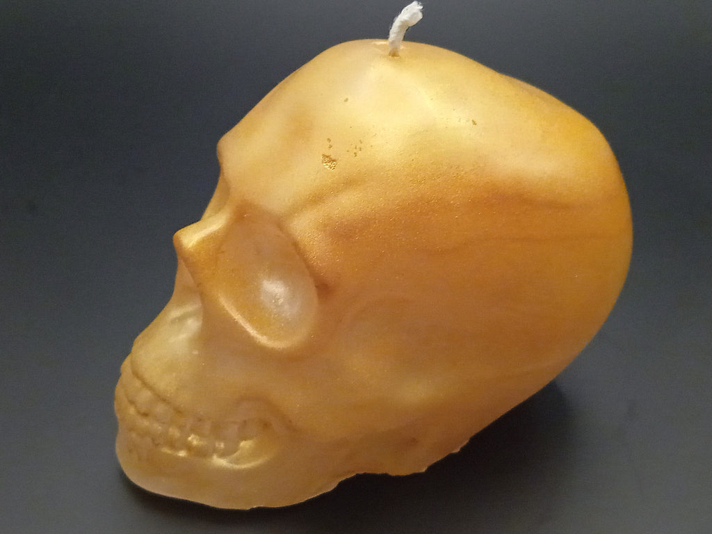 Large handmade gold skull candle by Fly Design