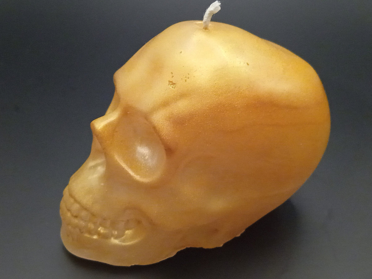 Large handmade gold skull candle by Fly Design