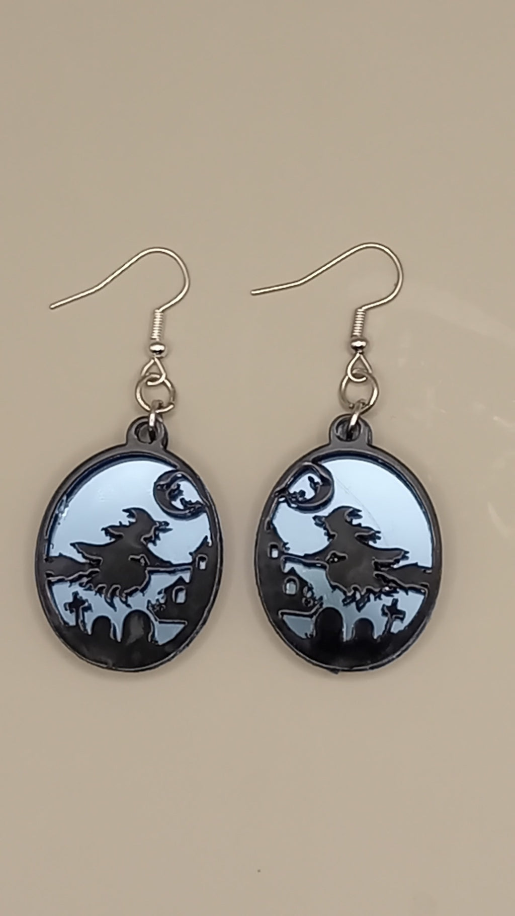 Blue mirrored layered witch earrings with black acrylic witch scene and silver hooks