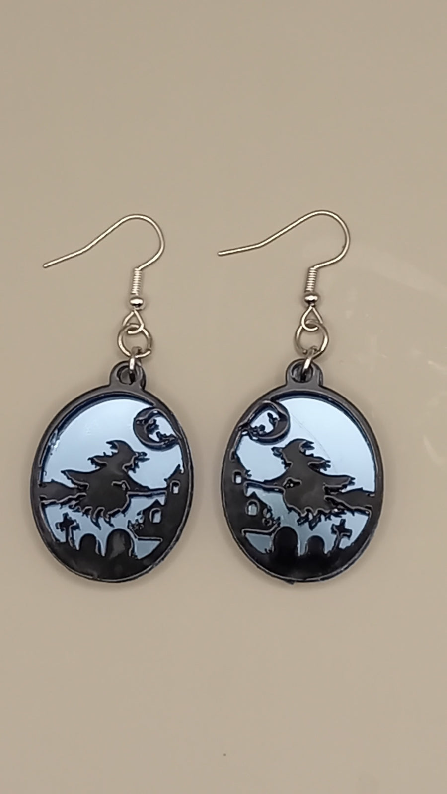 Blue mirrored layered witch earrings with black acrylic witch scene and silver hooks