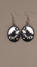 Silver mirrored layered witch earrings with black acrylic witch scene and silver hooks