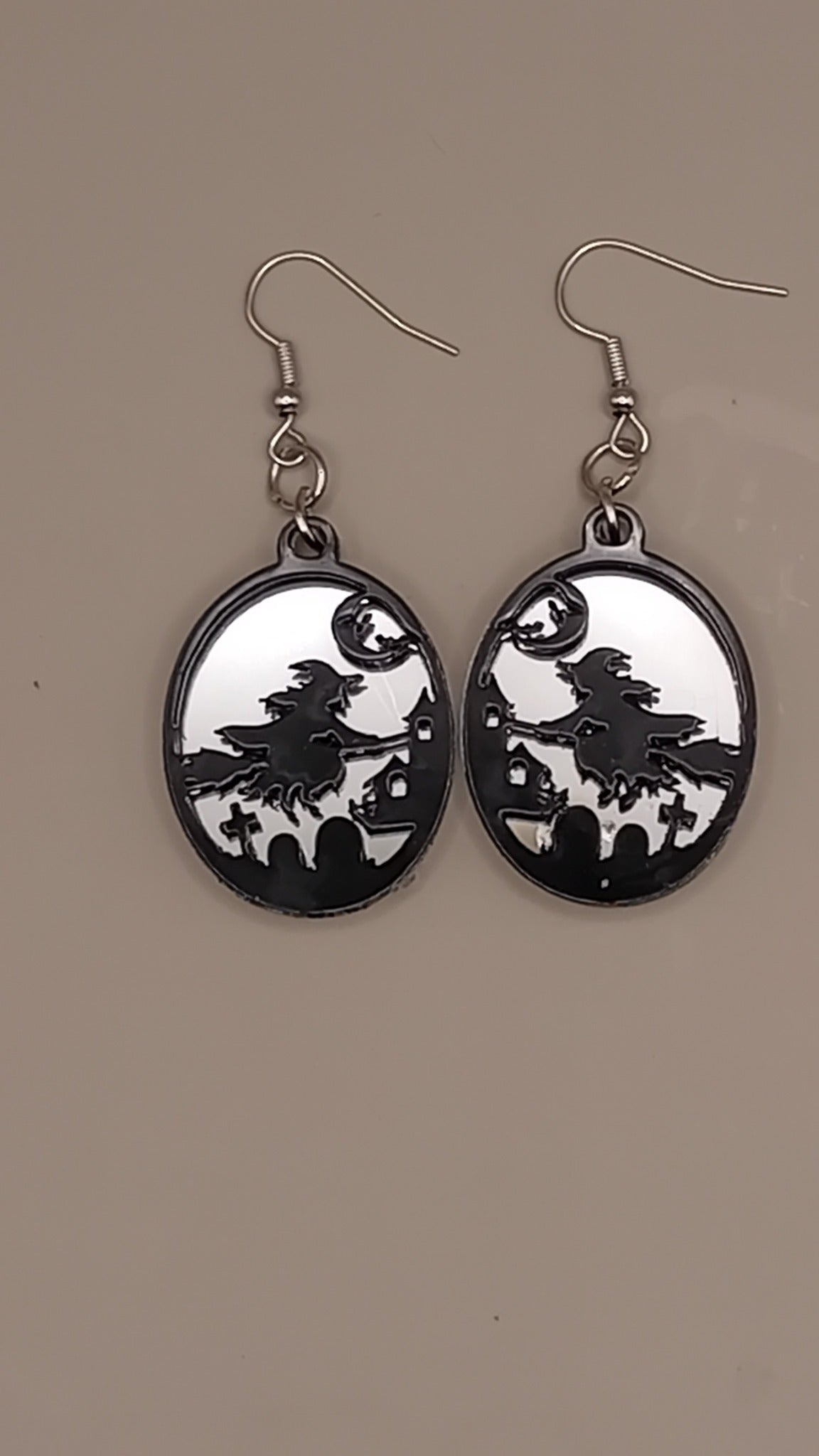 Silver mirrored layered witch earrings with black acrylic witch scene and silver hooks